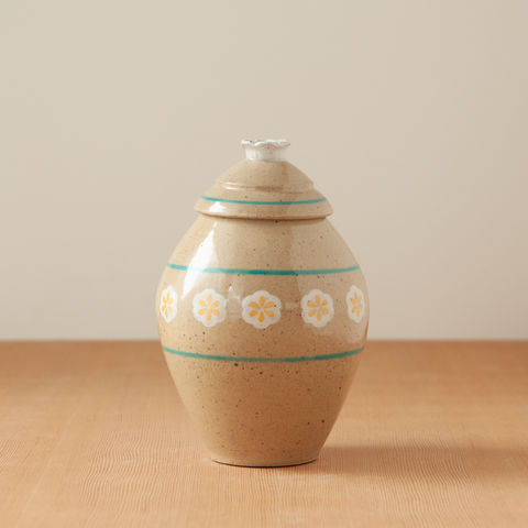 Jar with White Flower